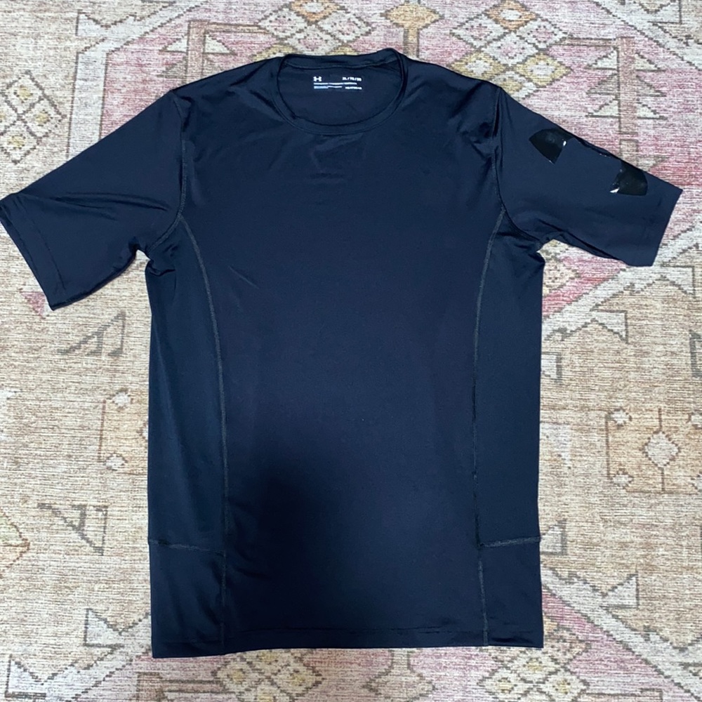 Under Armour Men’s Heatgear Black Compression shirt size xl new without tags!